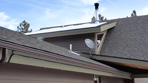 Image of house rooftop in the spring